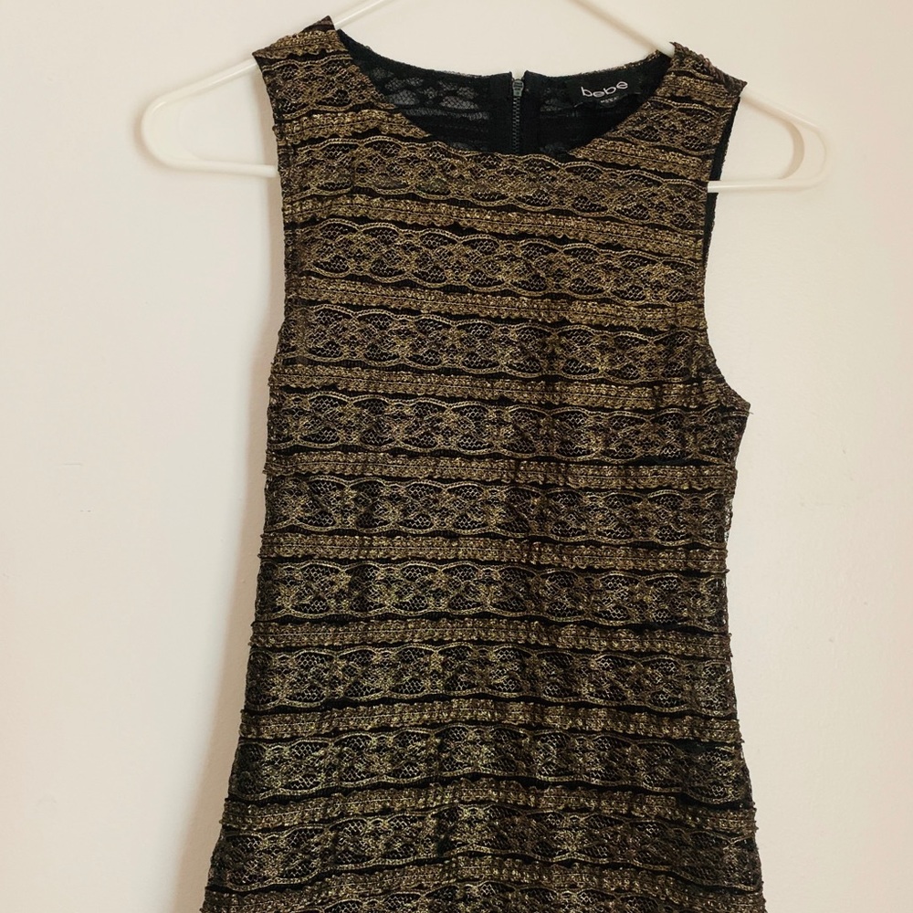 Bebe gold & black lace top